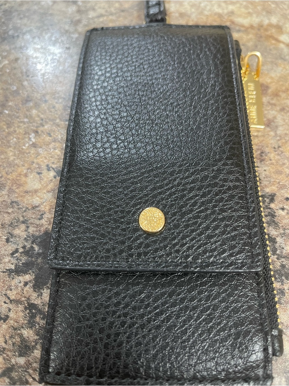 Anne Klein black pebble leather zip wristlet with gold hardware